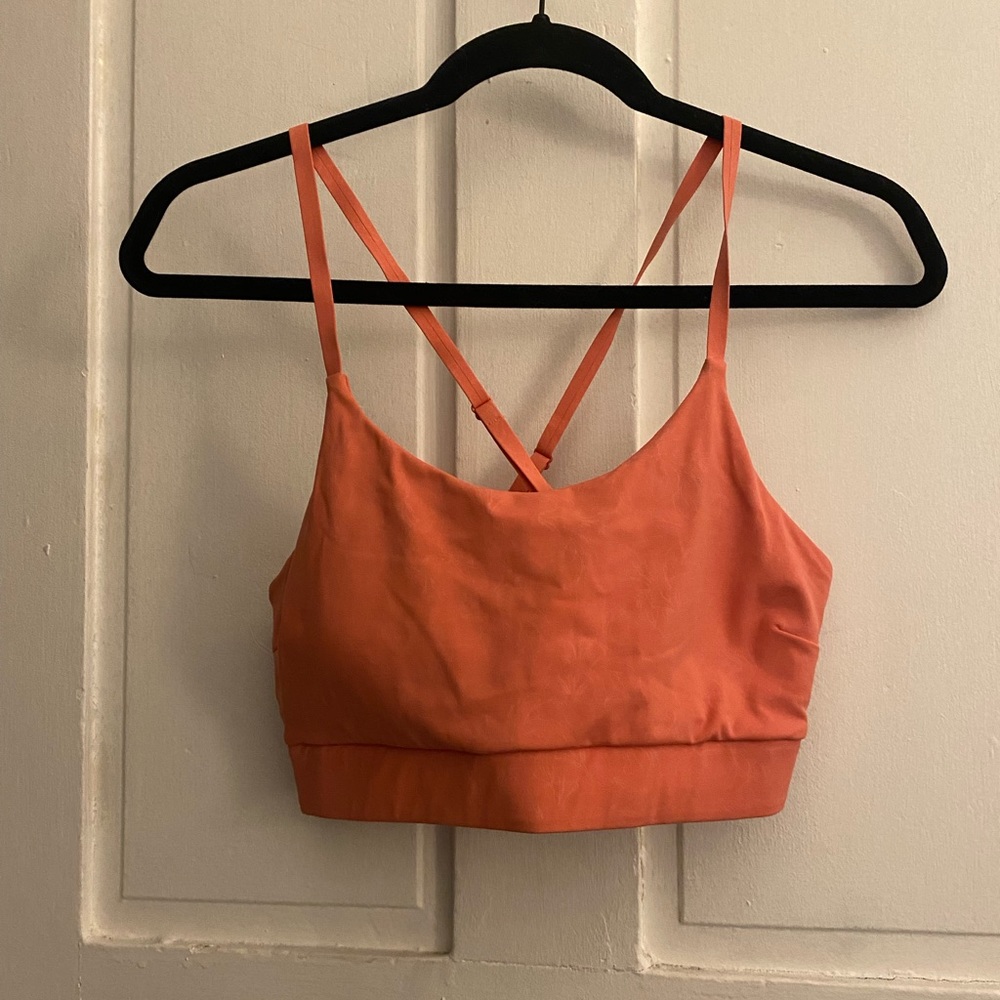 salmon colored sports bra!